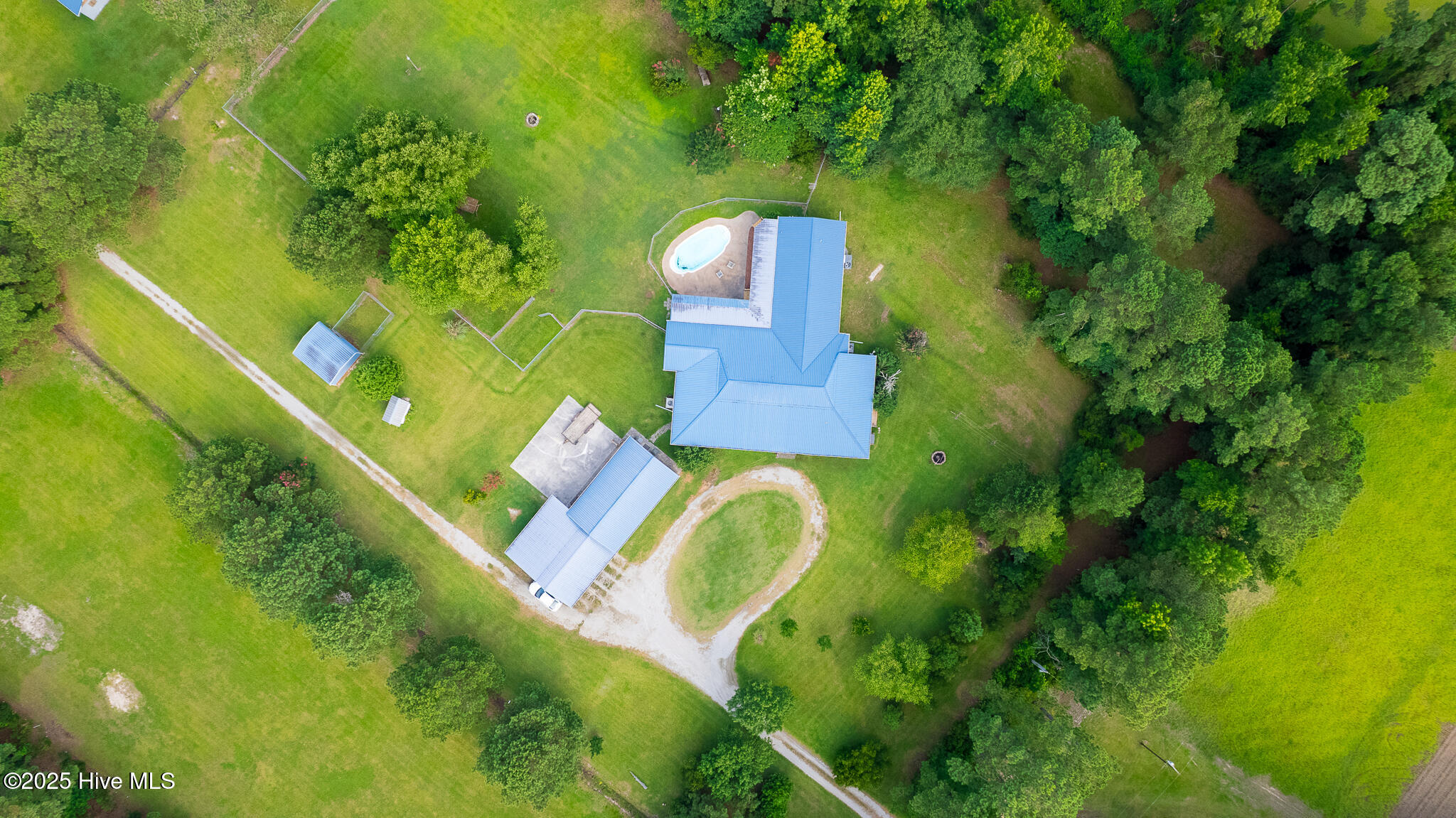 161 Howard Lane Swansboro, NC 28584 - Photo 28 of 56 The expansive backyard is delineated by a 6'high chainlink fence enclosing a bit of the treeline but