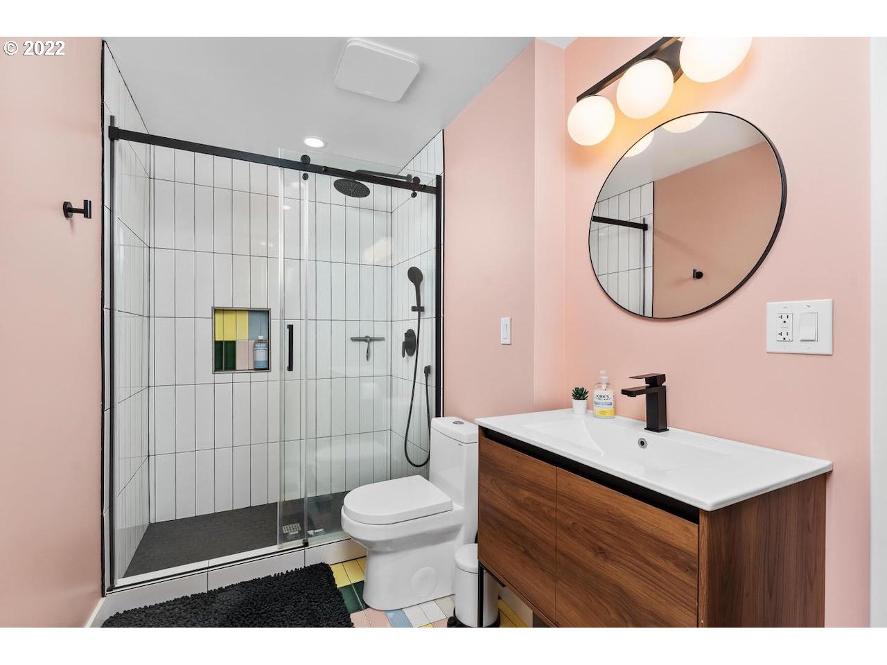 10668 Southwest 41st Avenue Portland, OR 97219 - Photo 11 of 32 a bathroom with a sink a toilet and shower
