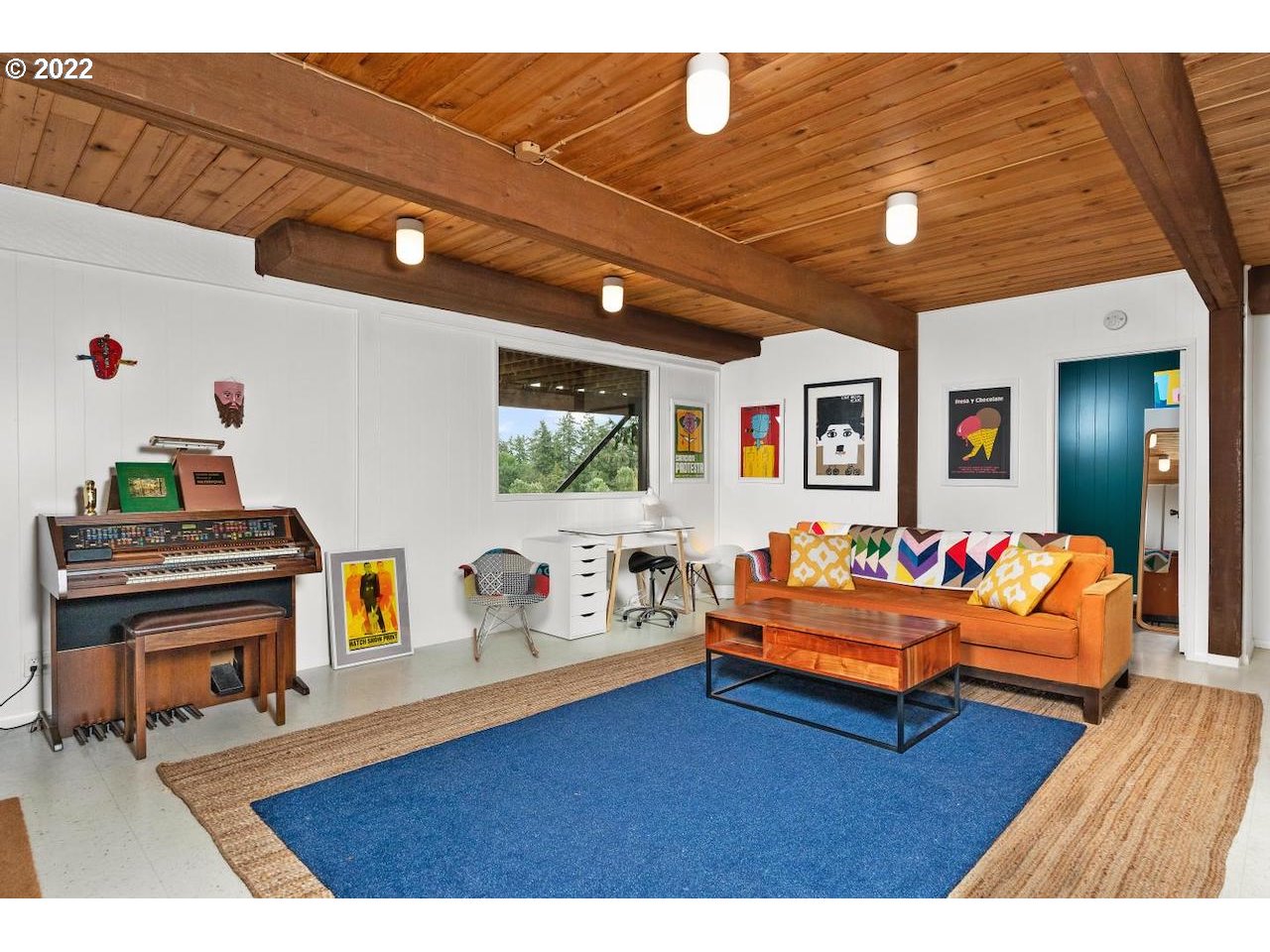 10668 Southwest 41st Avenue Portland, OR 97219 - Photo 18 of 32 a living room with furniture and a wooden floor
