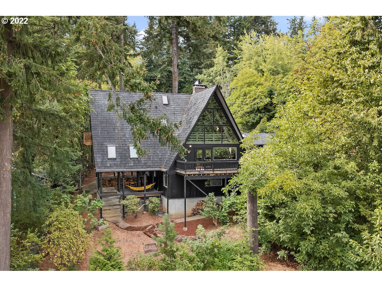 10668 Southwest 41st Avenue Portland, OR 97219 - Photo 28 of 32 a aerial view of a house with a yard