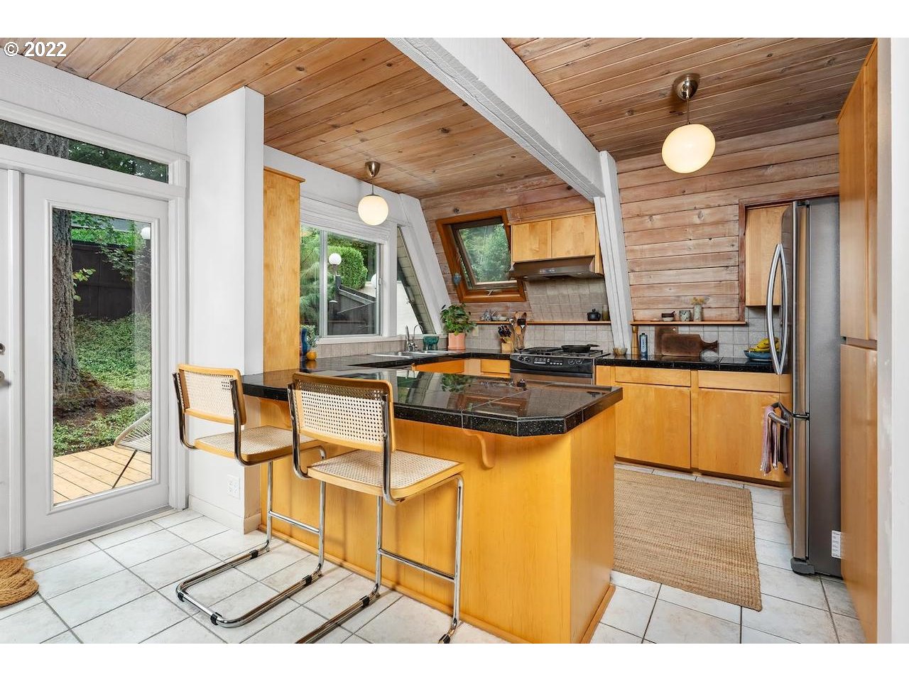 10668 Southwest 41st Avenue Portland, OR 97219 - Photo 8 of 32 a kitchen with a sink and a window