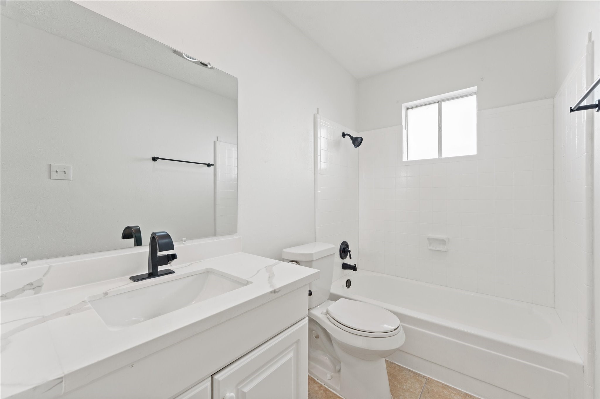 23122 Cimber Lane Spring, TX 77373 - Photo 16 of 25 a bathroom with a sink a toilet and a tub