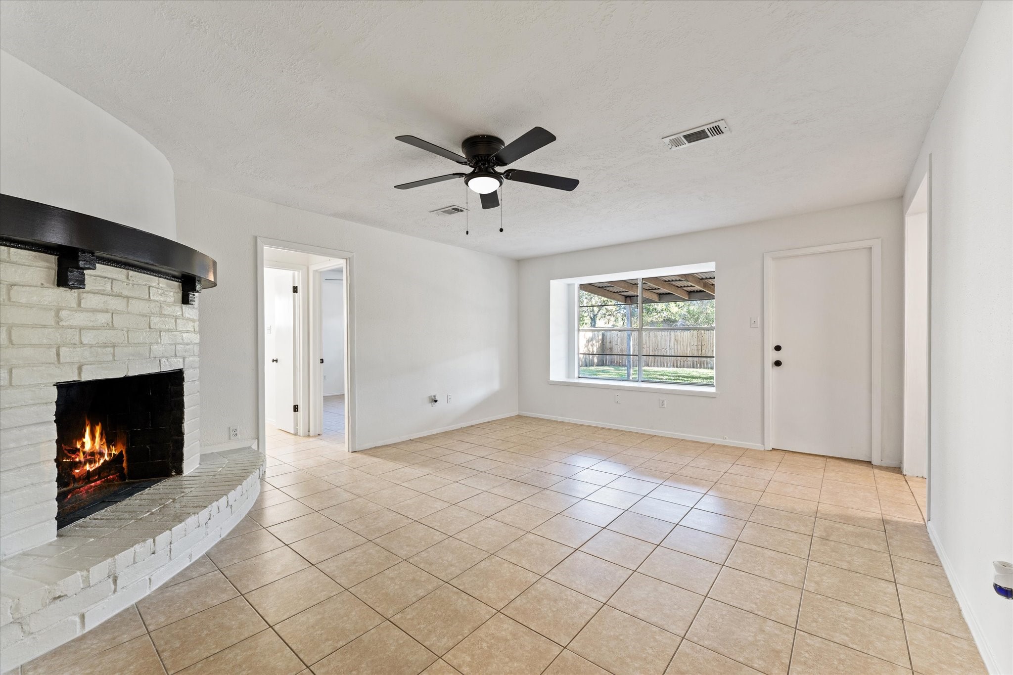 23122 Cimber Lane Spring, TX 77373 - Photo 3 of 25 a view of an empty room with fire place