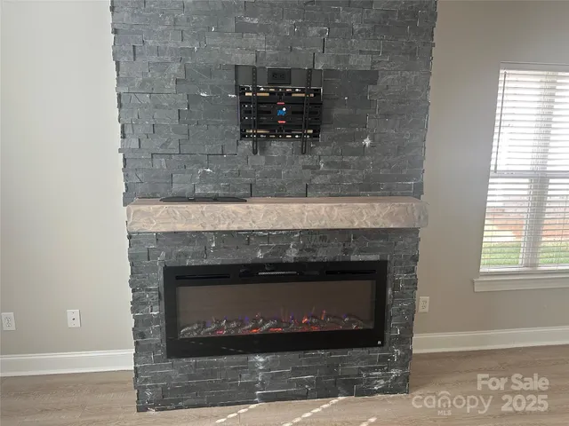 a living room with a fireplace