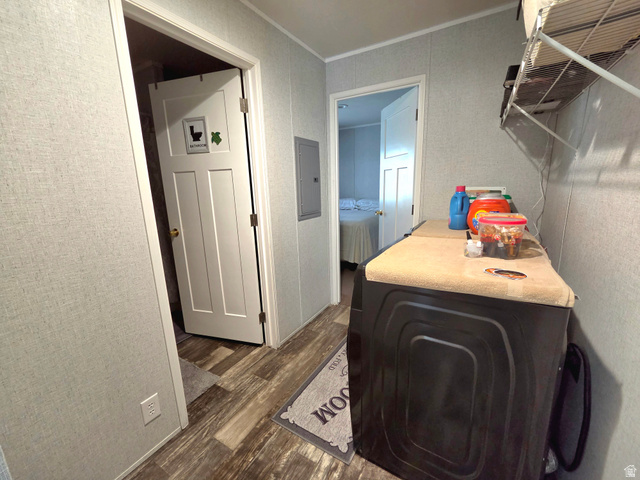 597 North State Street, Unit 67 Orem, UT 84057 - Photo 14 of 23 Laundry area with washer / clothes dryer, dark wood finished floors, ornamental molding, and electric panel