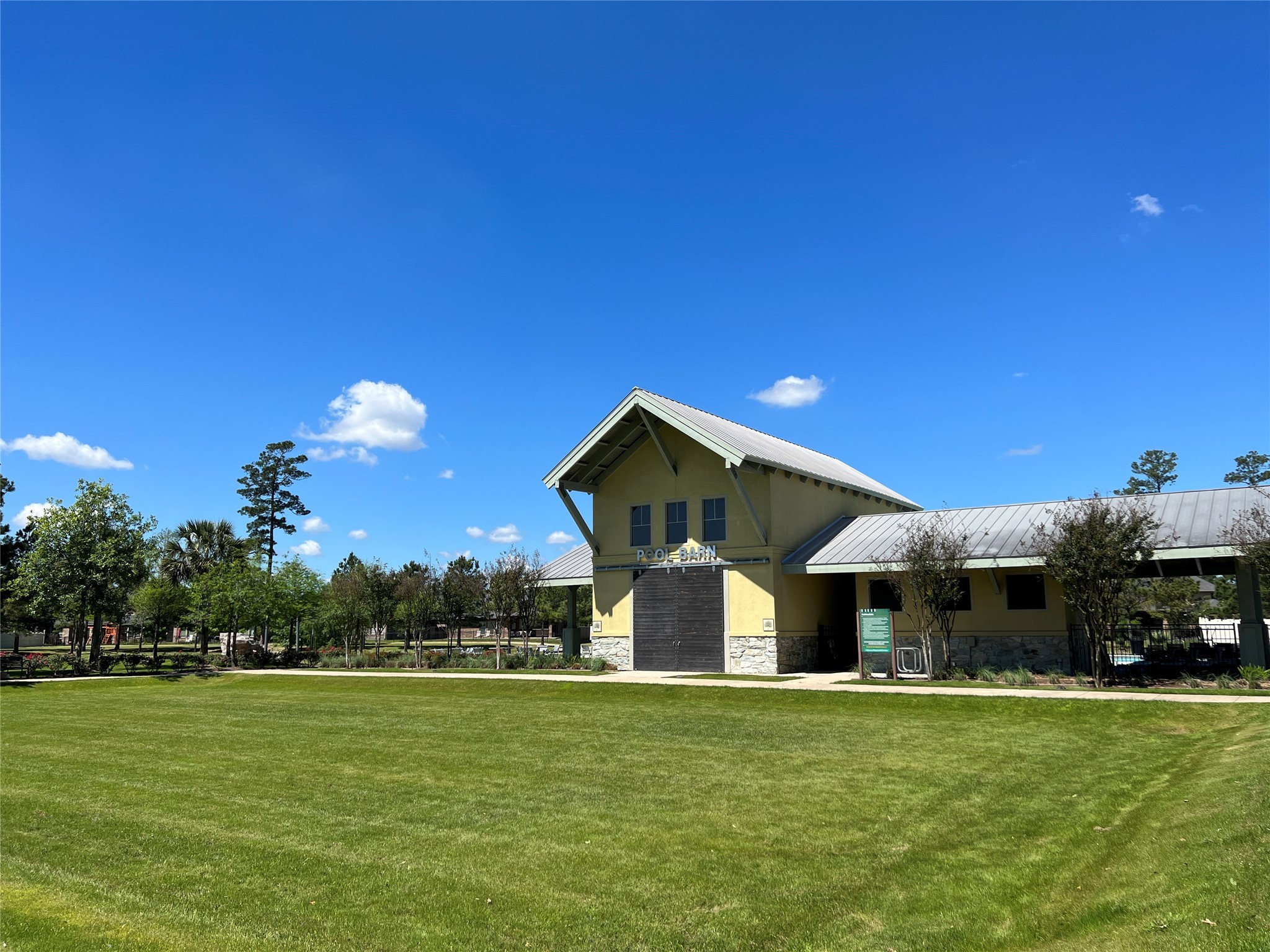 10542 Preserve Way Conroe, TX 77385 - Photo 18 of 26 a front view of a house with a garden