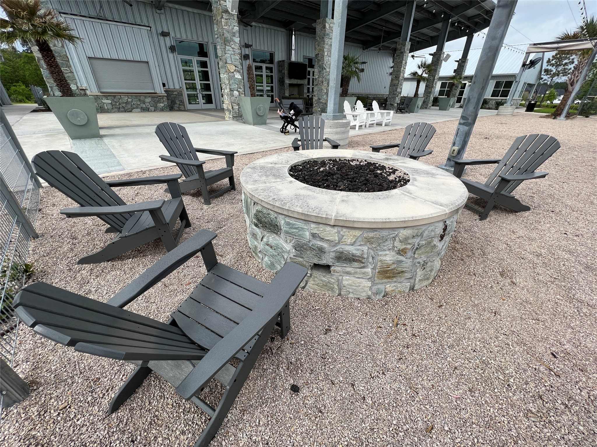 10542 Preserve Way Conroe, TX 77385 - Photo 24 of 26 a front view of a house with outdoor seating
