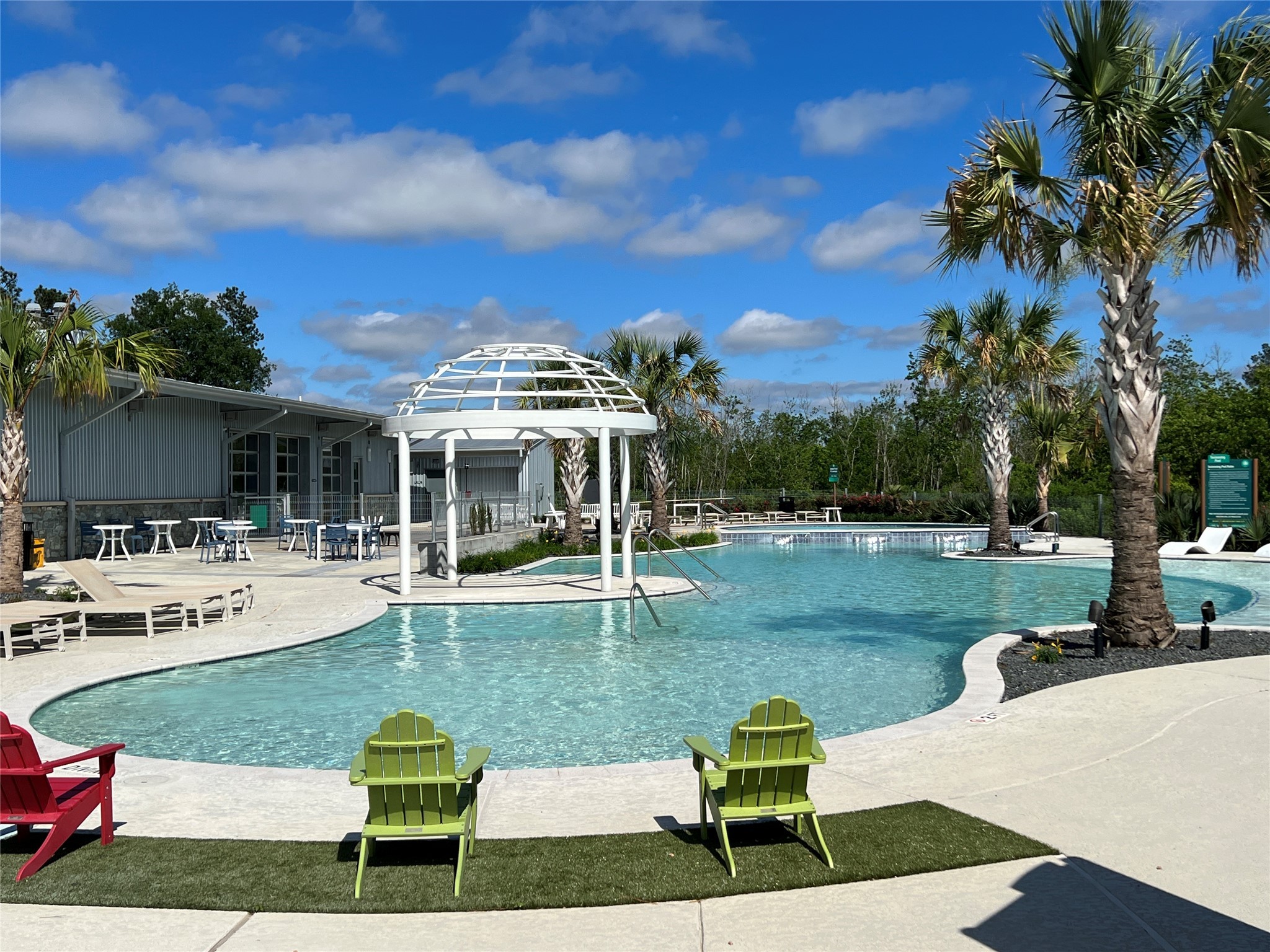10542 Preserve Way Conroe, TX 77385 - Photo 26 of 26 a view of a house with swimming pool and sitting area