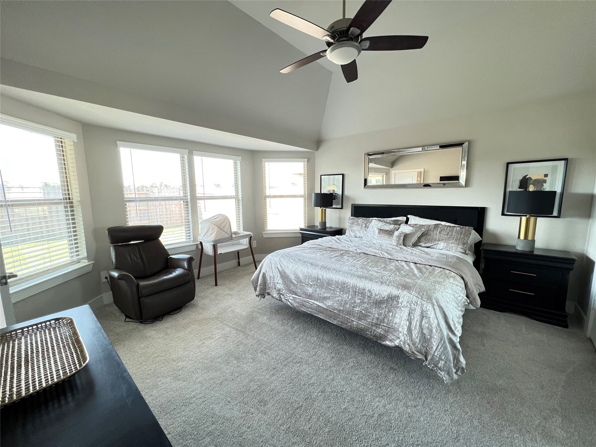 10542 Preserve Way Conroe, TX 77385 - Photo 9 of 26 a bedroom with a bed couches and a couch