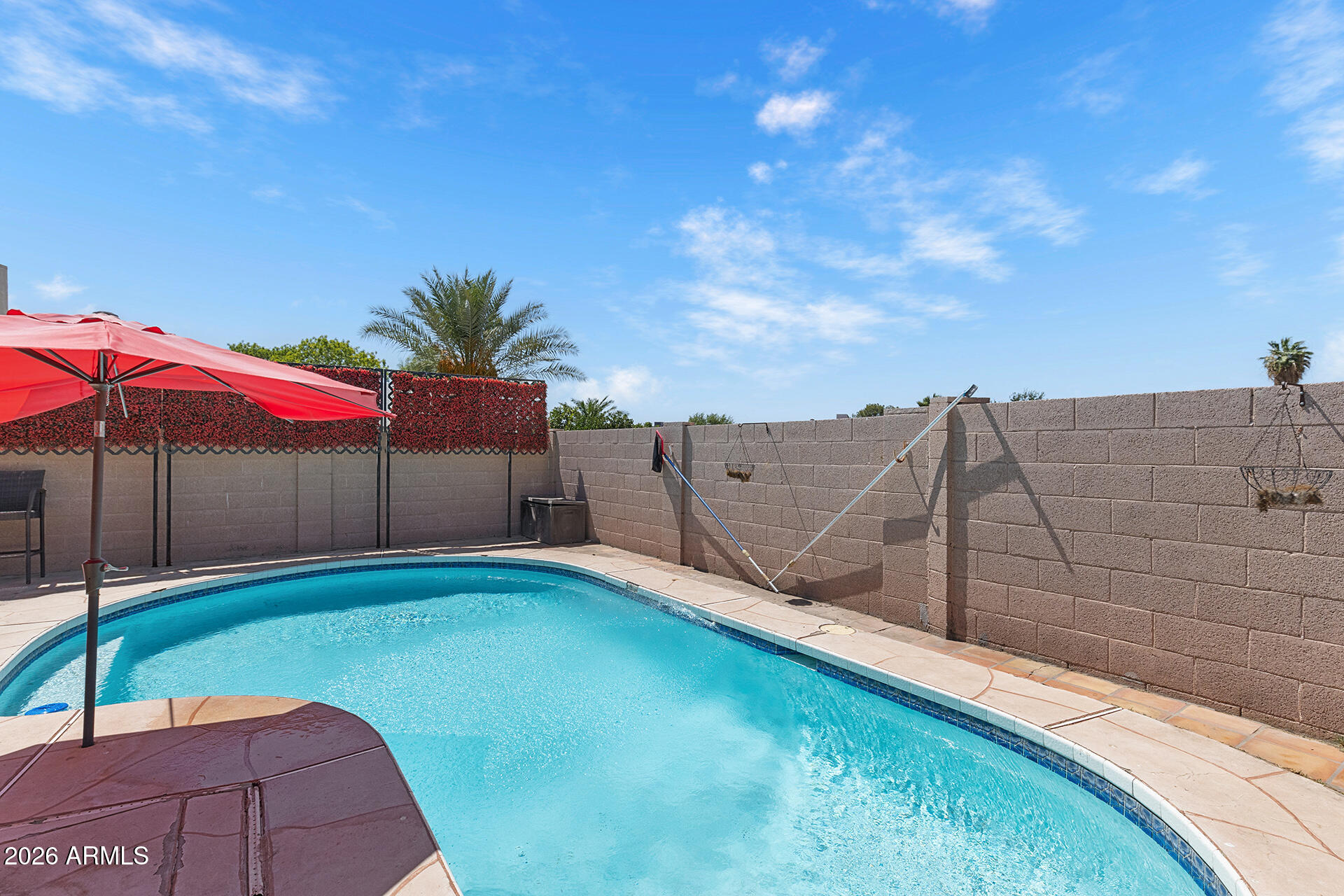9002 West Coronado Road Phoenix, AZ 85037 - Photo 53 of 54 a view of a backyard