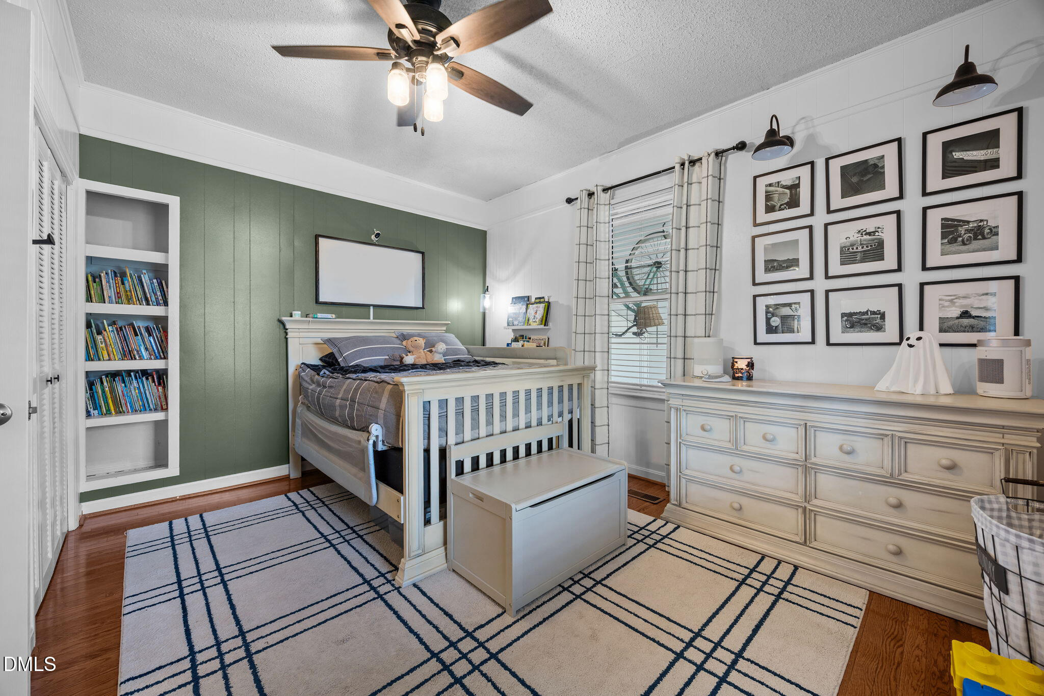 203 North 11th Street Erwin, NC 28339 - Photo 14 of 27 a bedroom with furniture and window