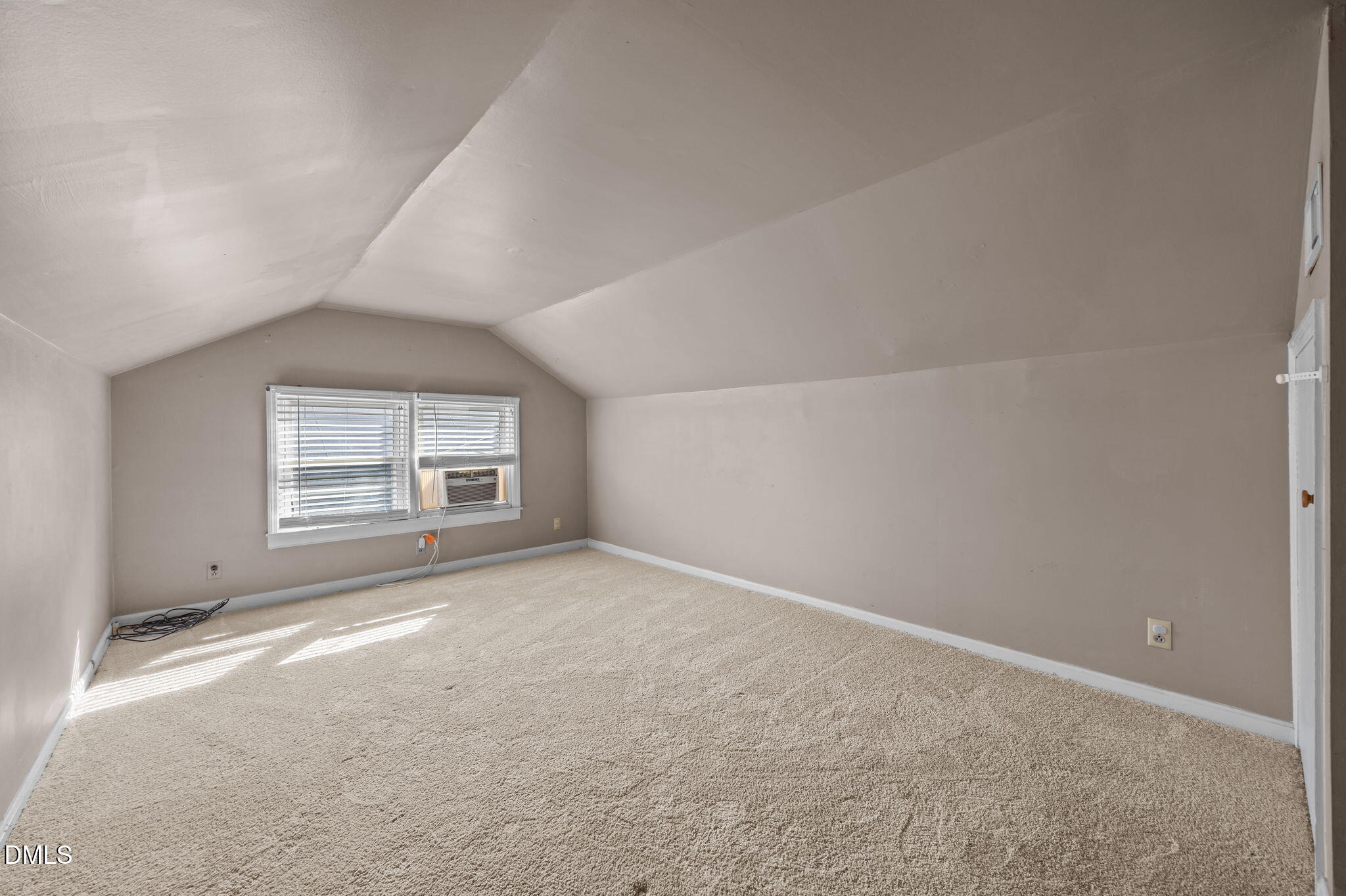 203 North 11th Street Erwin, NC 28339 - Photo 18 of 27 an empty room with windows