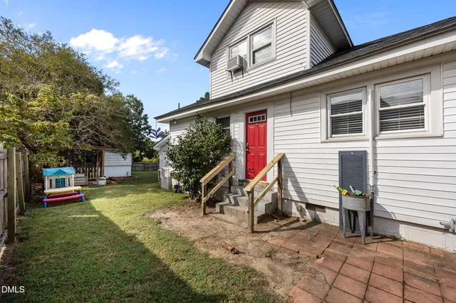 a view of a house with a big yard