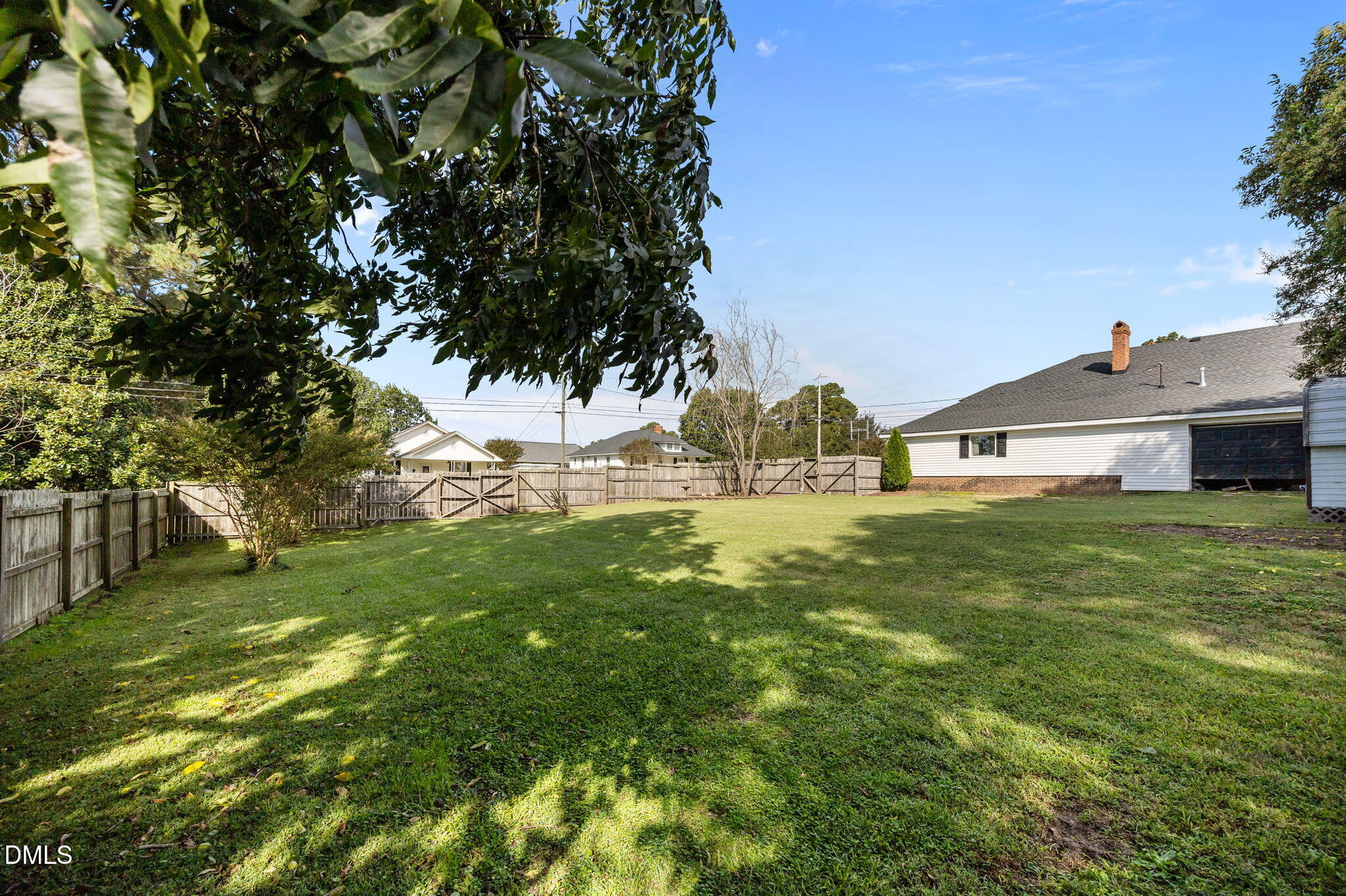 203 North 11th Street Erwin, NC 28339 - Photo 22 of 27 a view of a house with a big yard
