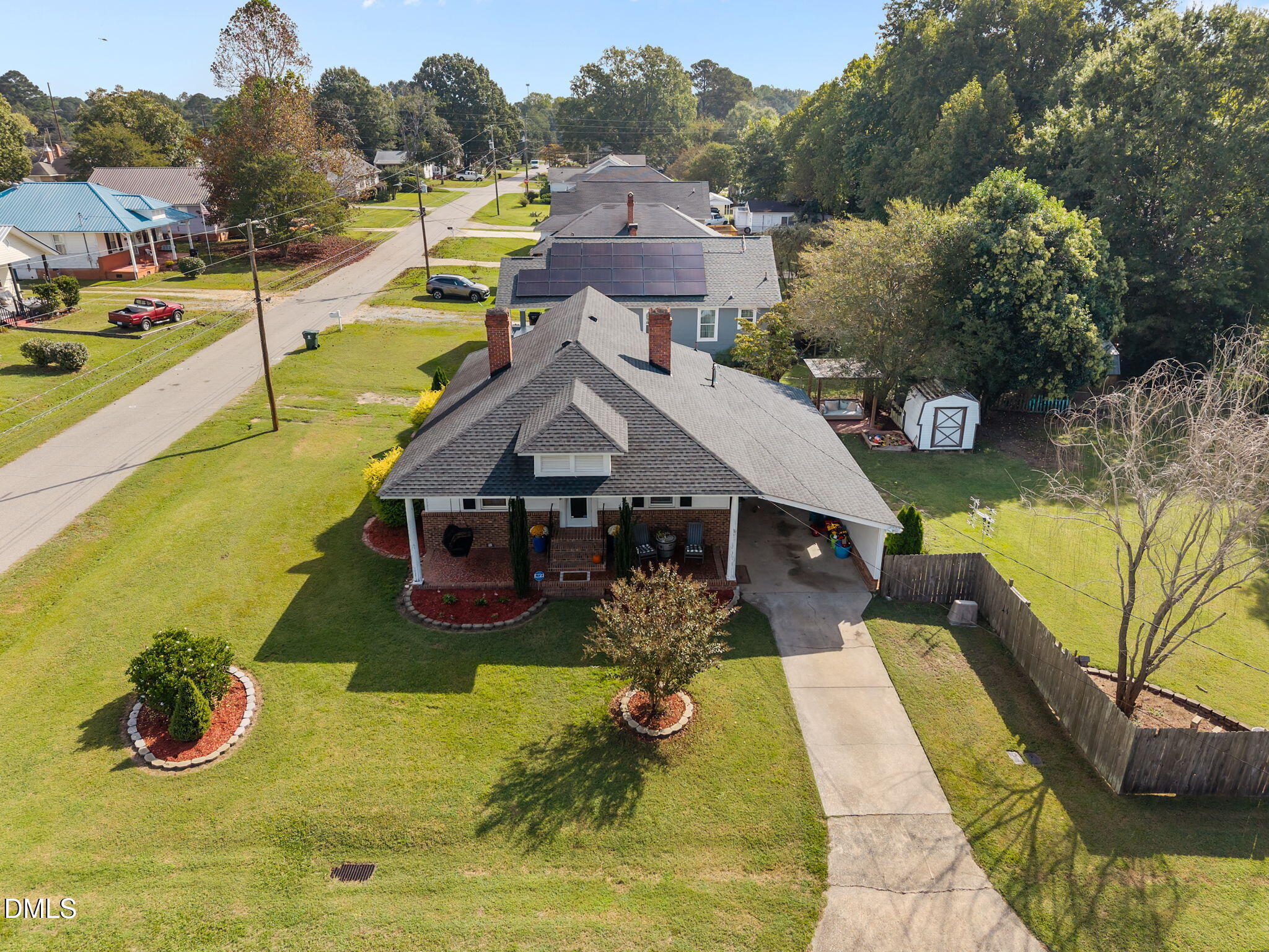 203 North 11th Street Erwin, NC 28339 - Photo 26 of 27 an aerial view of a house with swimming pool
