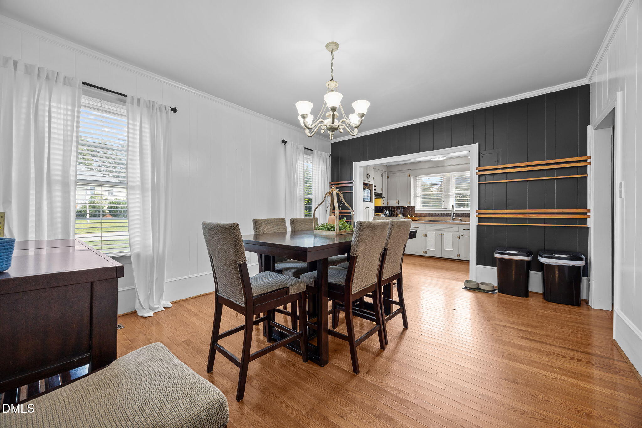 203 North 11th Street Erwin, NC 28339 - Photo 6 of 27 a view of a dining room with furniture window and wooden floor