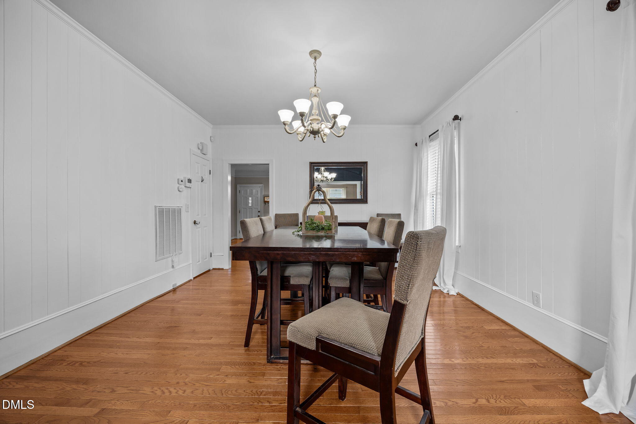 203 North 11th Street Erwin, NC 28339 - Photo 7 of 27 a view of a dining room with furniture and window