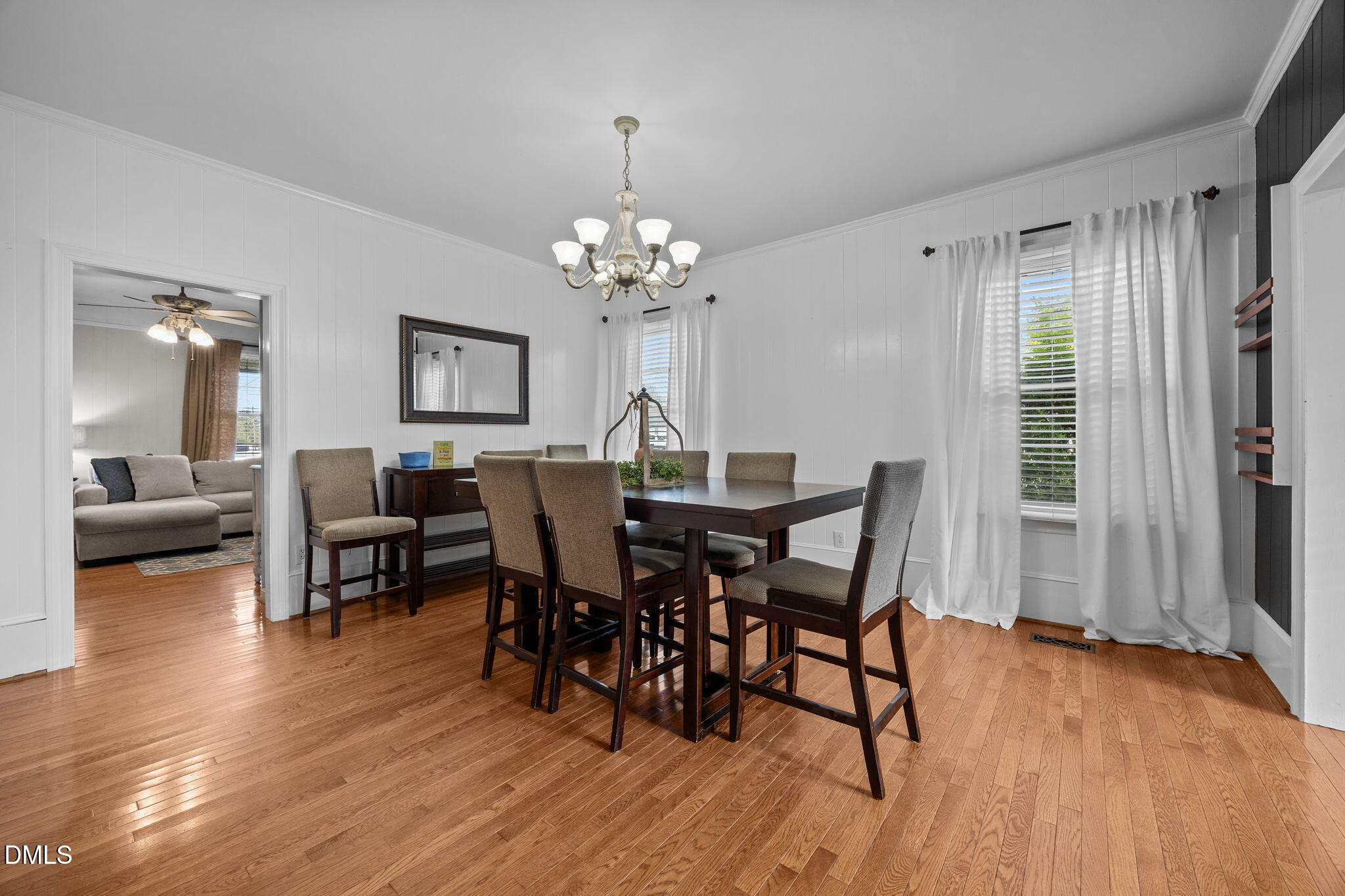 203 North 11th Street Erwin, NC 28339 - Photo 8 of 27 a view of a dining room with furniture window and wooden floor