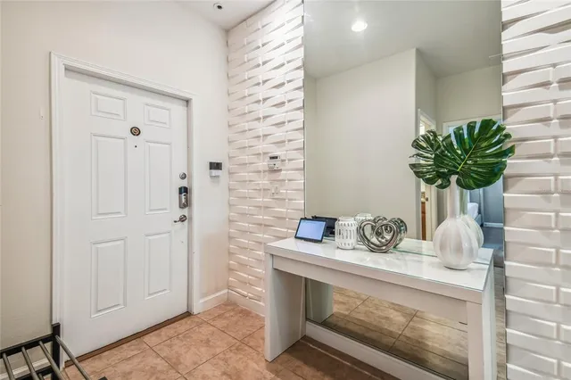 a kitchen with a table and chairs in it