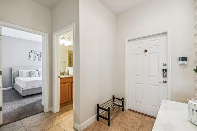 a kitchen with stainless steel appliances granite countertop a refrigerator and a stove