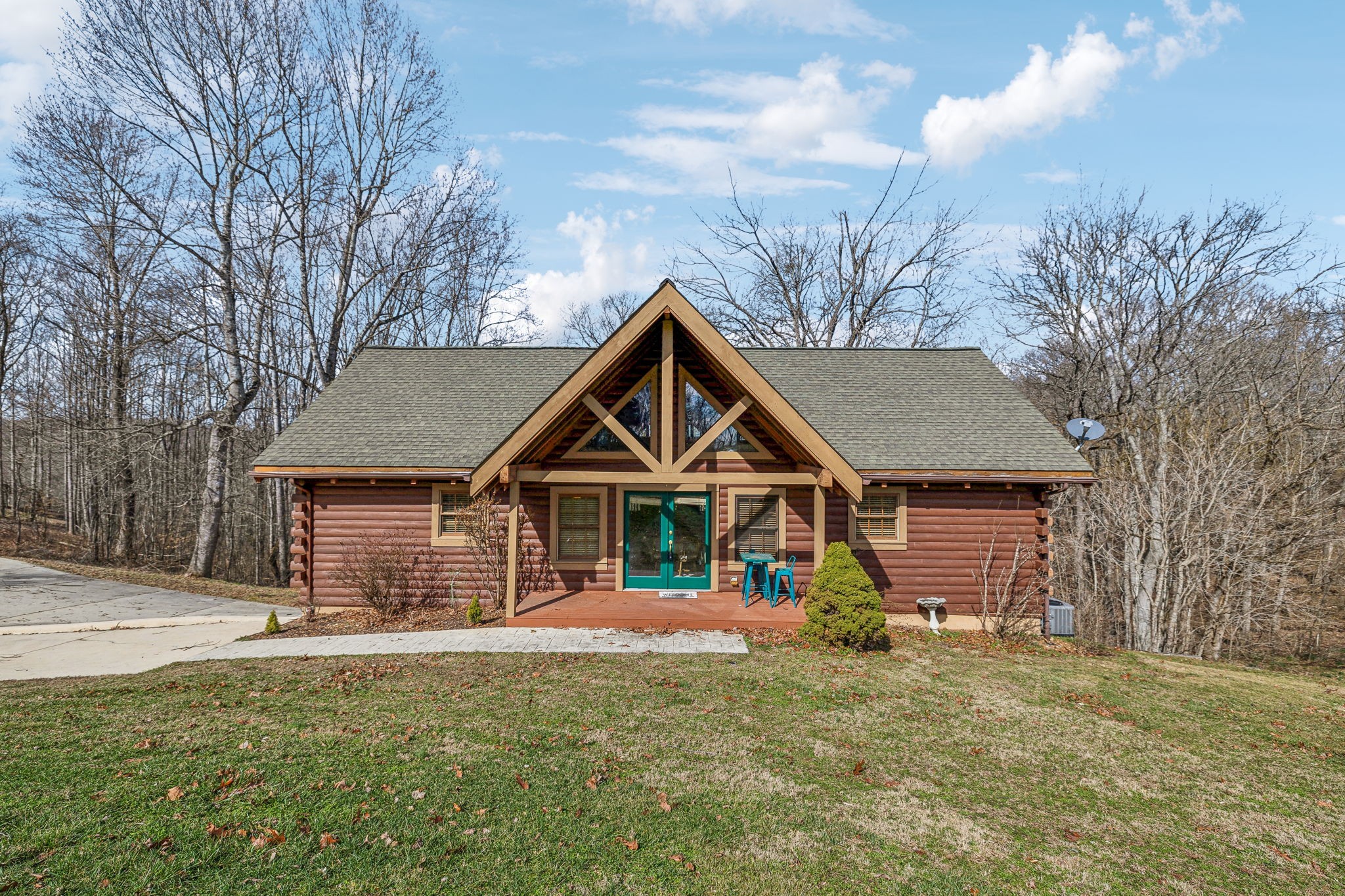 4485 Coconut Ridge Road Smithville, TN 37166 - Photo 1 of 33 a view of a house with a yard and large tree