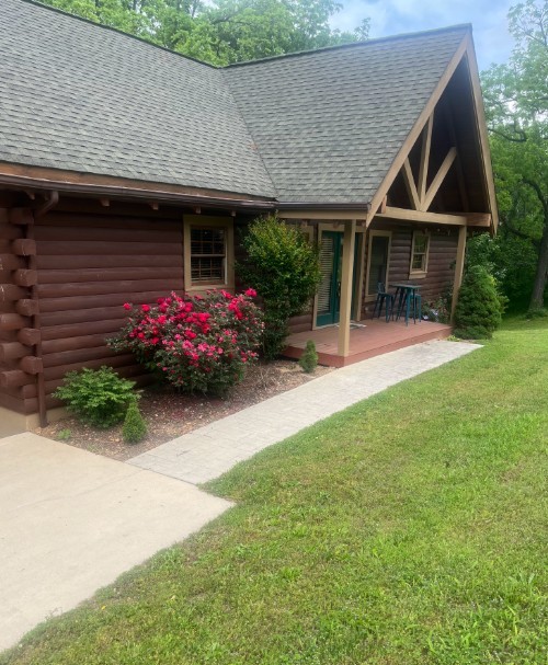 4485 Coconut Ridge Road Smithville, TN 37166 - Photo 2 of 33 a front view of a house with a yard