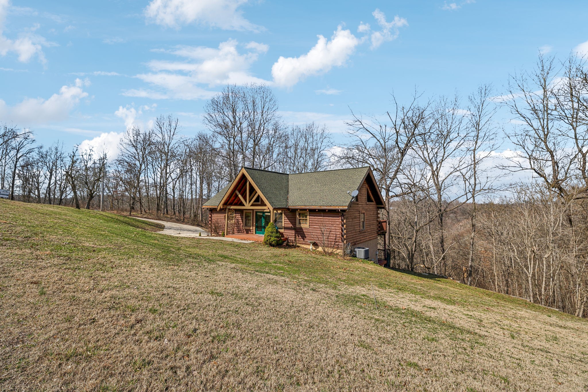4485 Coconut Ridge Road Smithville, TN 37166 - Photo 28 of 33 a view of a house with a yard