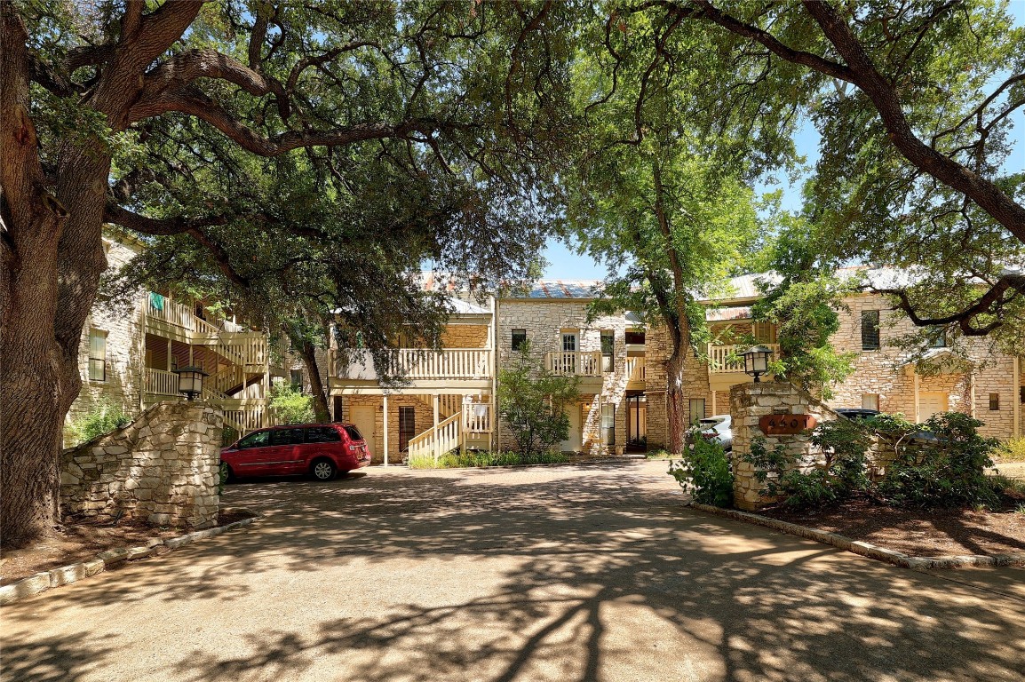 a view of street with parked cars