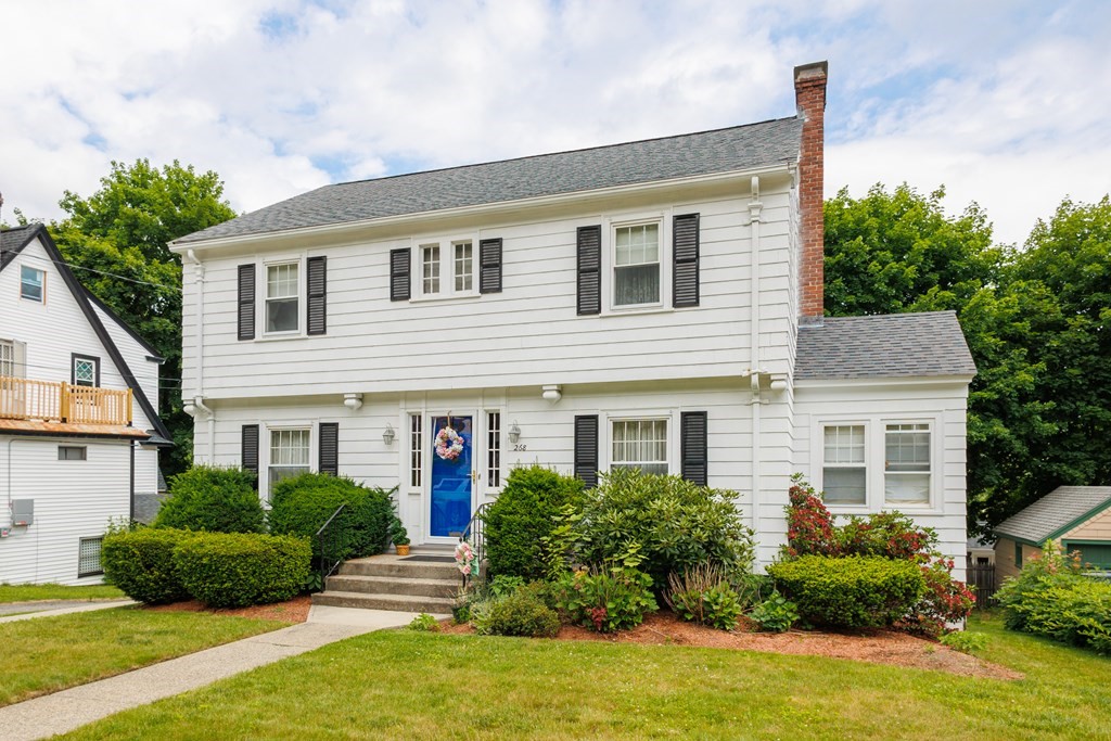 268 Beverly Road Worcester, MA 01605 - Photo 1 of 28 a front view of a house with a yard