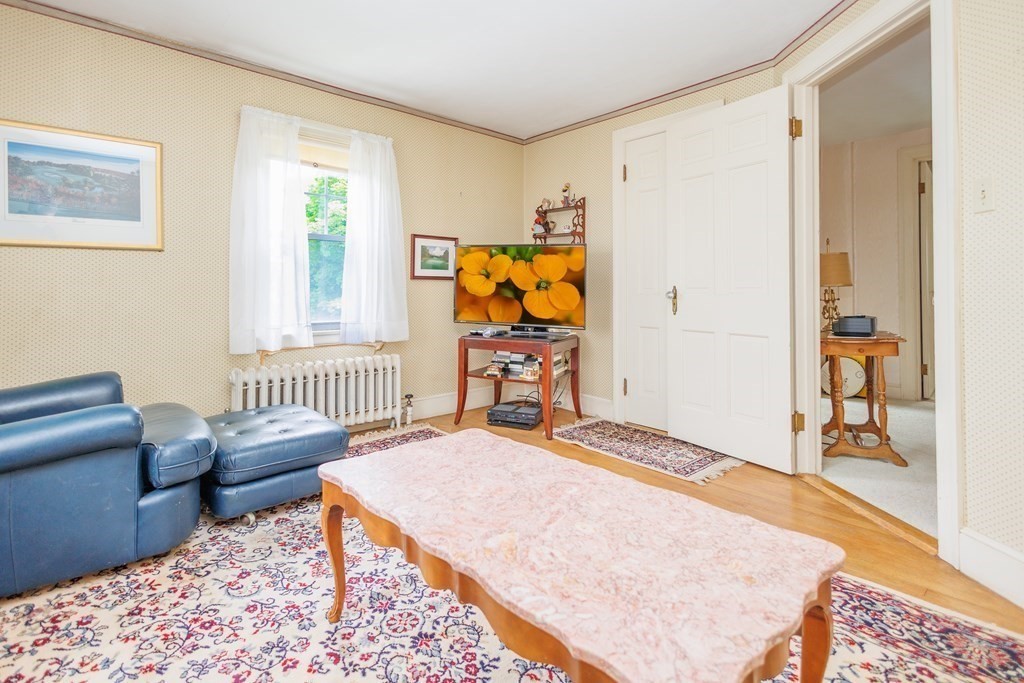 268 Beverly Road Worcester, MA 01605 - Photo 15 of 28 a bedroom with furniture and a window