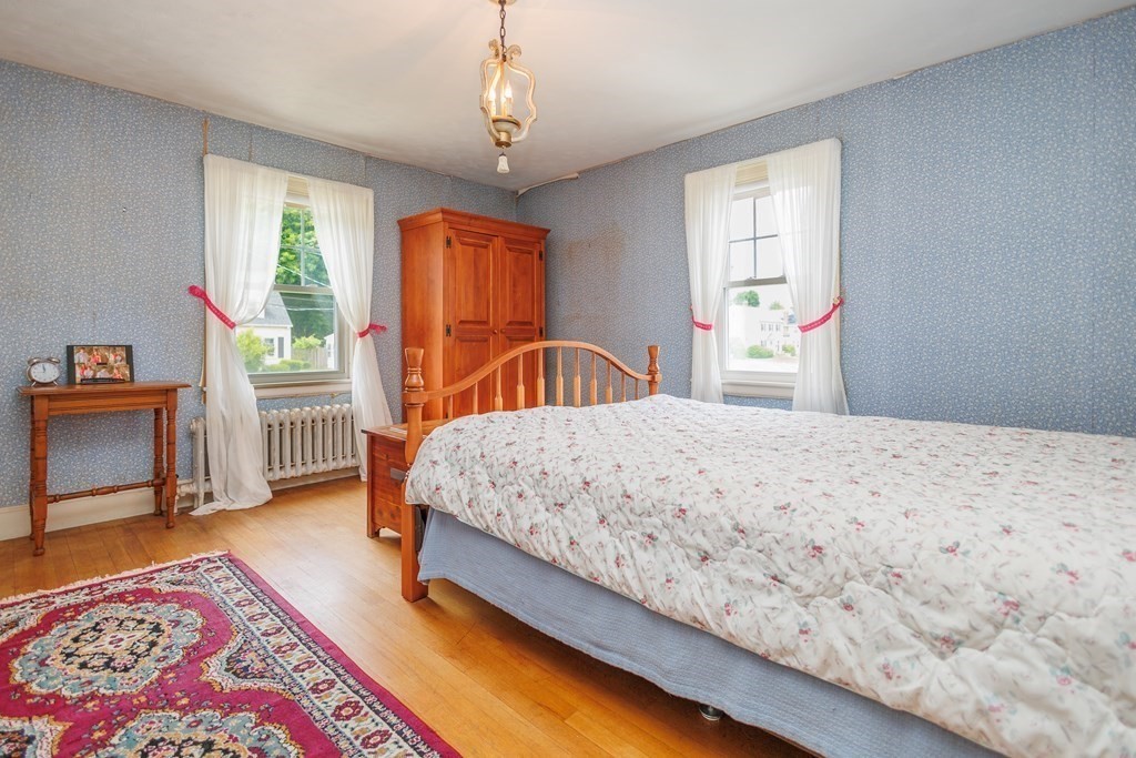 268 Beverly Road Worcester, MA 01605 - Photo 16 of 28 a bedroom with a bed and a window