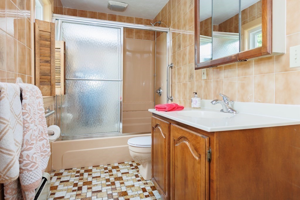 268 Beverly Road Worcester, MA 01605 - Photo 18 of 28 a bathroom with a sink toilet and shower