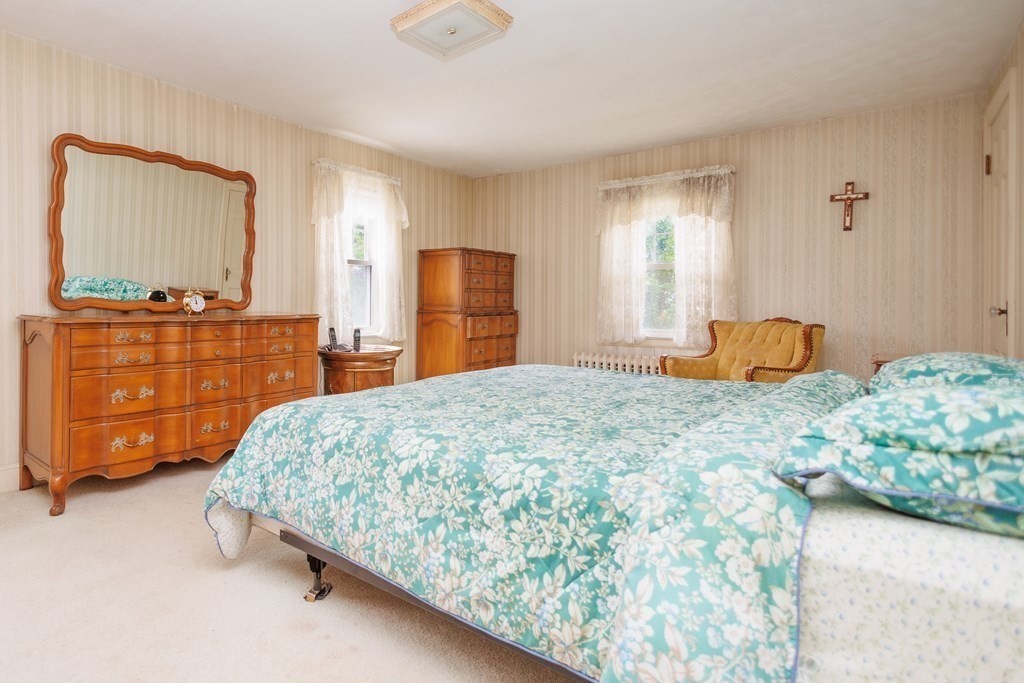 268 Beverly Road Worcester, MA 01605 - Photo 22 of 28 a bedroom with a bed and dresser