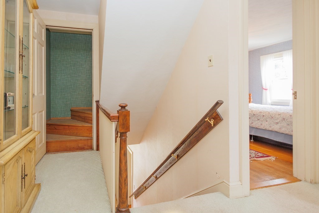 268 Beverly Road Worcester, MA 01605 - Photo 24 of 28 a view of a hallway with closet and wooden floor