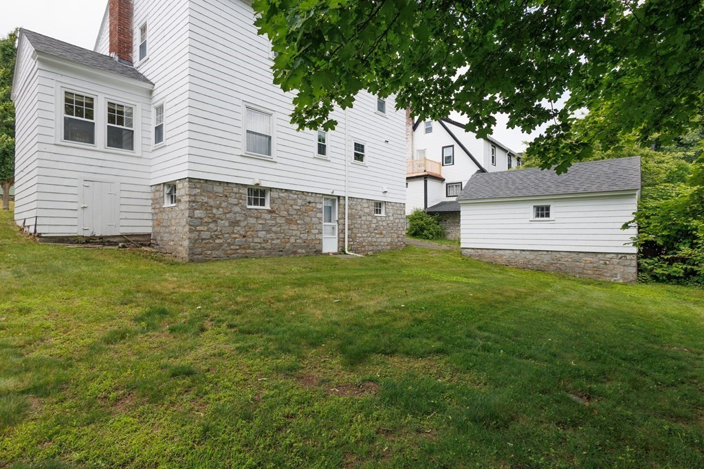 268 Beverly Road Worcester, MA 01605 - Photo 26 of 28 a view of a house with a yard