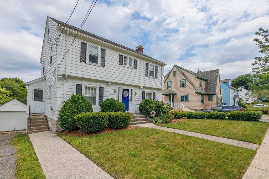 268 Beverly Road Worcester, MA 01605 - Photo 28 of 28 a front view of house with yard and green space