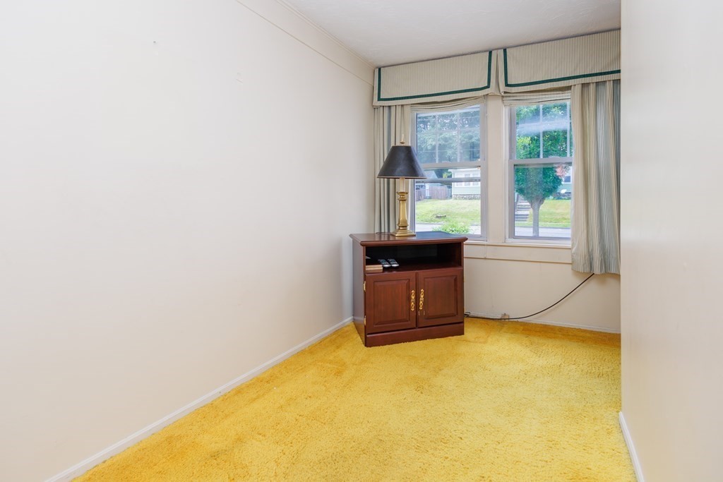 268 Beverly Road Worcester, MA 01605 - Photo 6 of 28 a view of an empty room with a window