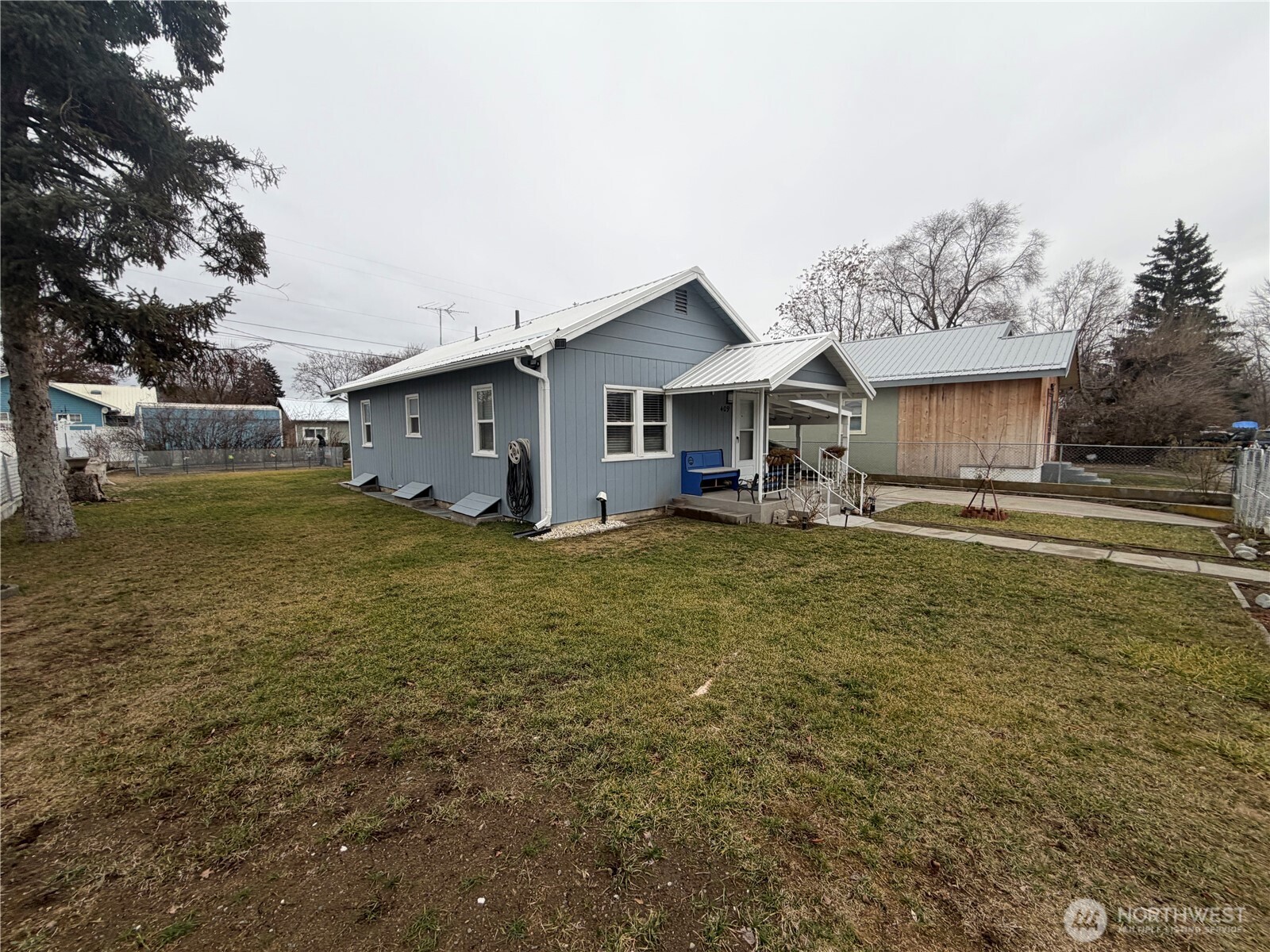 409 Birch Street South Omak, WA 98841 - Photo 2 of 32 a view of a house with a yard