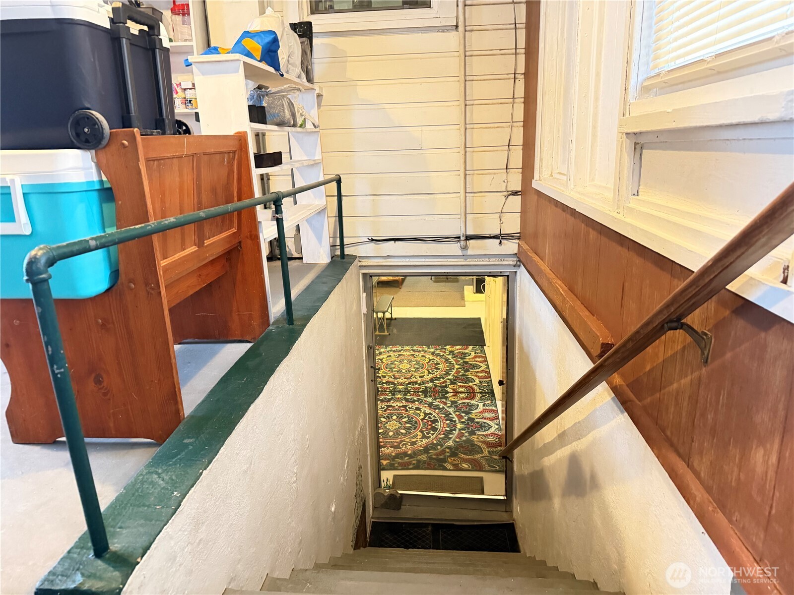 409 Birch Street South Omak, WA 98841 - Photo 21 of 32 a view of entryway with wooden floor and stairs