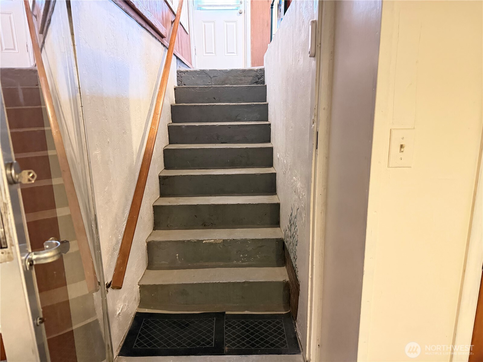 409 Birch Street South Omak, WA 98841 - Photo 22 of 32 a view of staircase with white walls