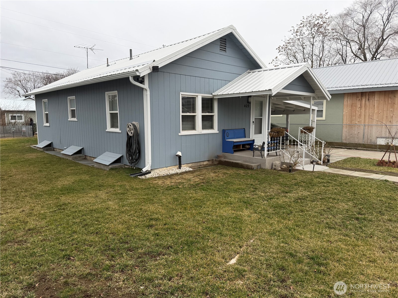 409 Birch Street South Omak, WA 98841 - Photo 32 of 32 a front view of house with yard and seating space