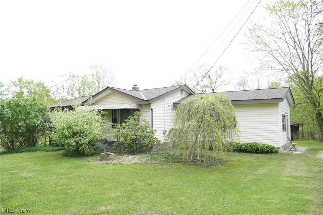 8661 Ravenna Road Chardon, OH 44024 - Photo 1 of 16 View of front of home with a front lawn