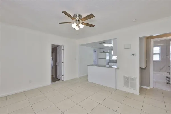 a view of a kitchen with closet area