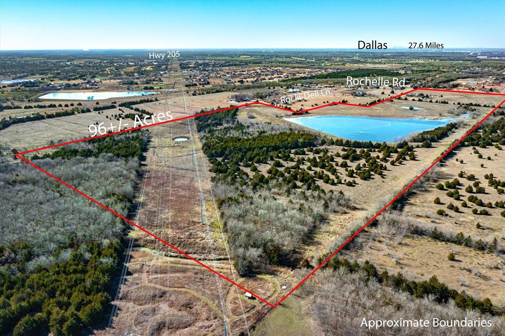 3273 Rochell Road Rockwall, TX 75032 - Photo 2 of 24 a view of a city and an ocean view