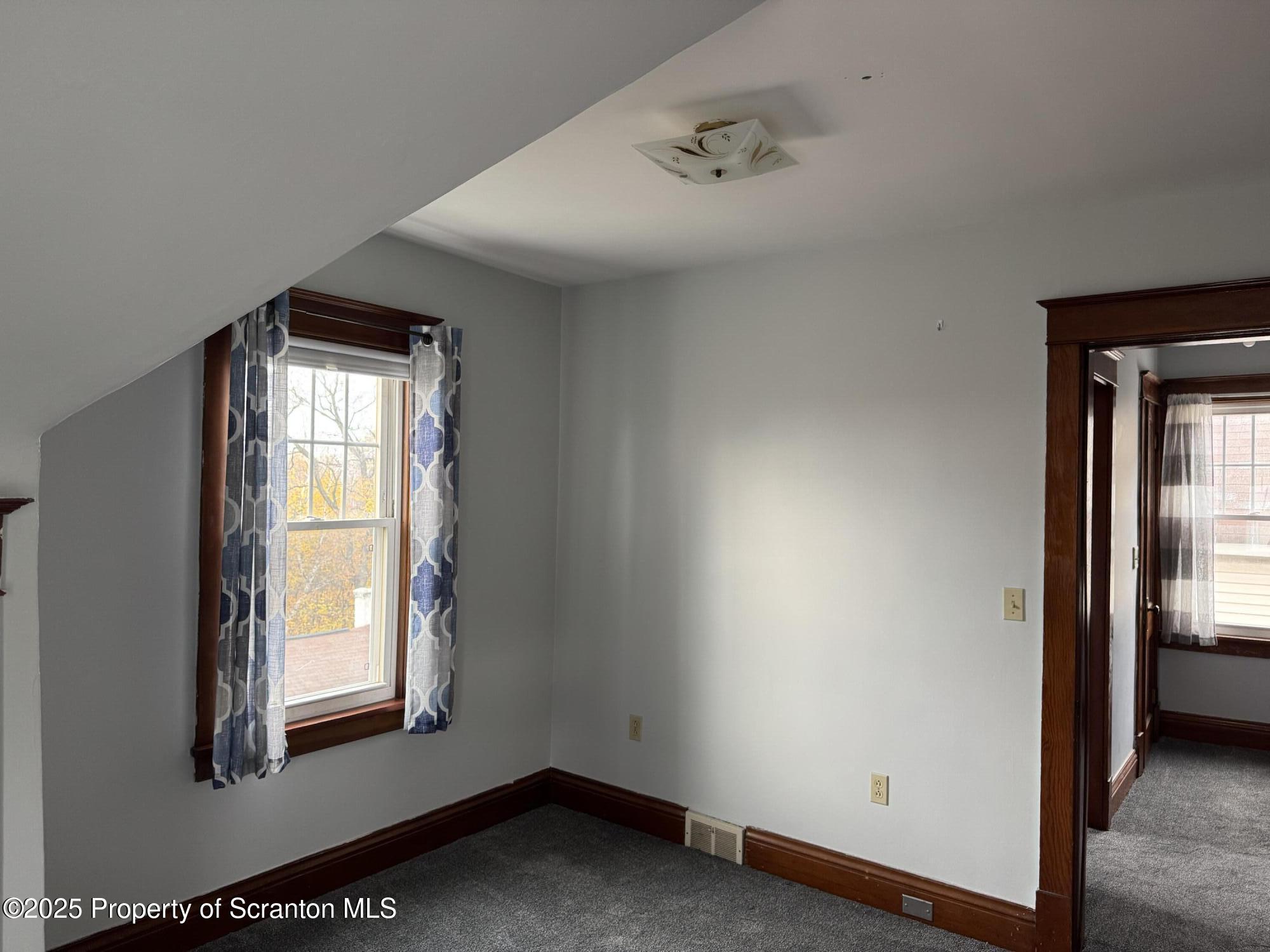 837 Matthew Avenue Scranton, PA 18510 - Photo 24 of 31 a view of an empty room and window