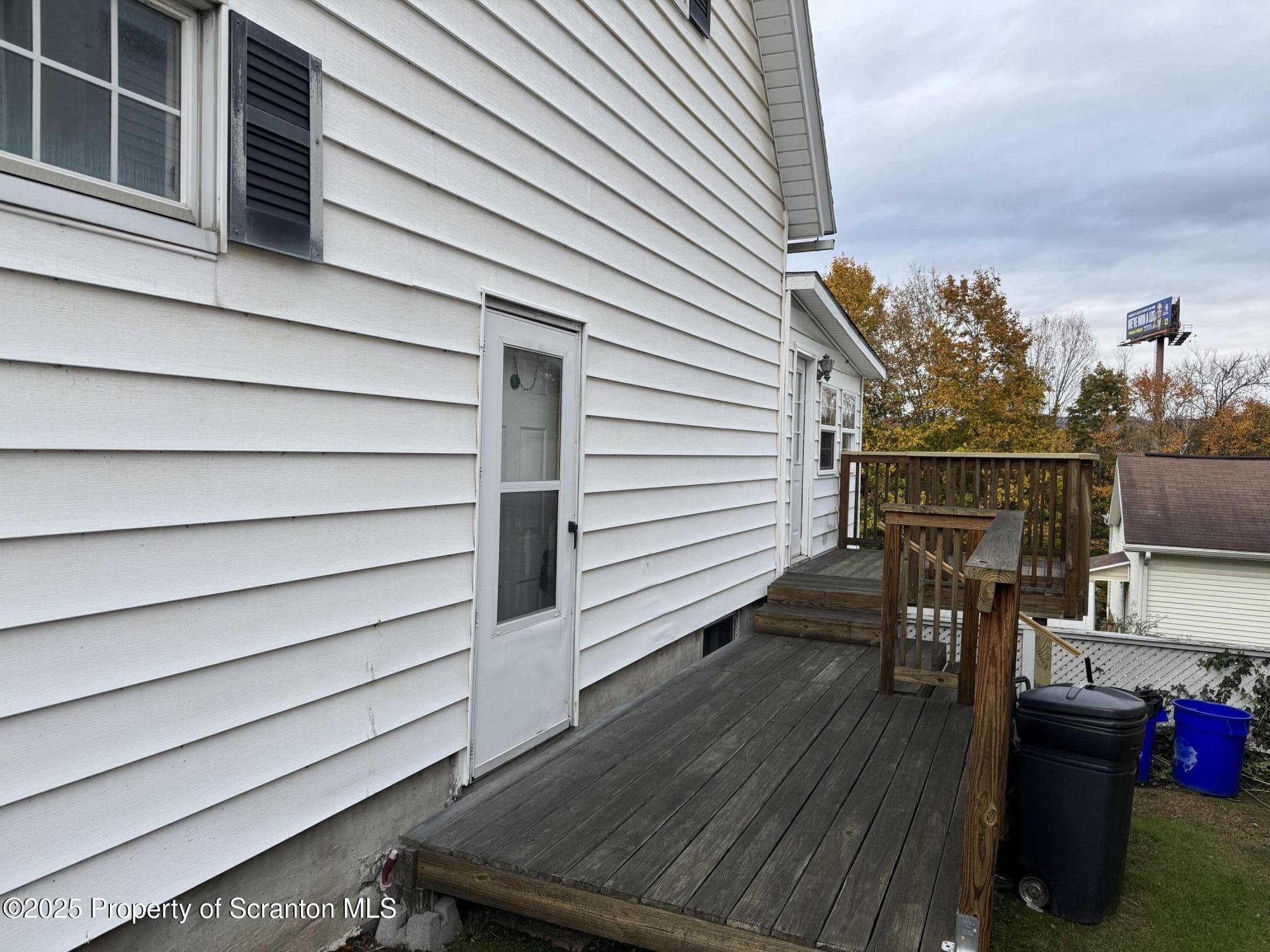 837 Matthew Avenue Scranton, PA 18510 - Photo 5 of 31 a view of balcony with two chairs and wooden floor