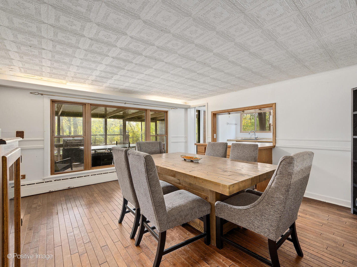 S639 Prince Crossing Road Winfield, IL 60190 - Photo 22 of 32 a dining room with furniture and wooden floor