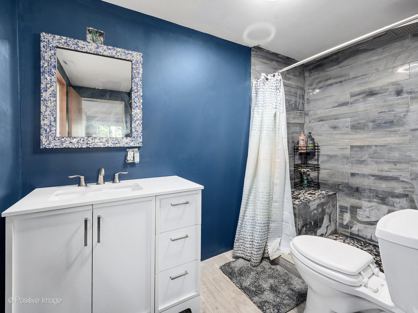 S639 Prince Crossing Road Winfield, IL 60190 - Photo 29 of 32 a bathroom with a toilet sink vanity and mirror