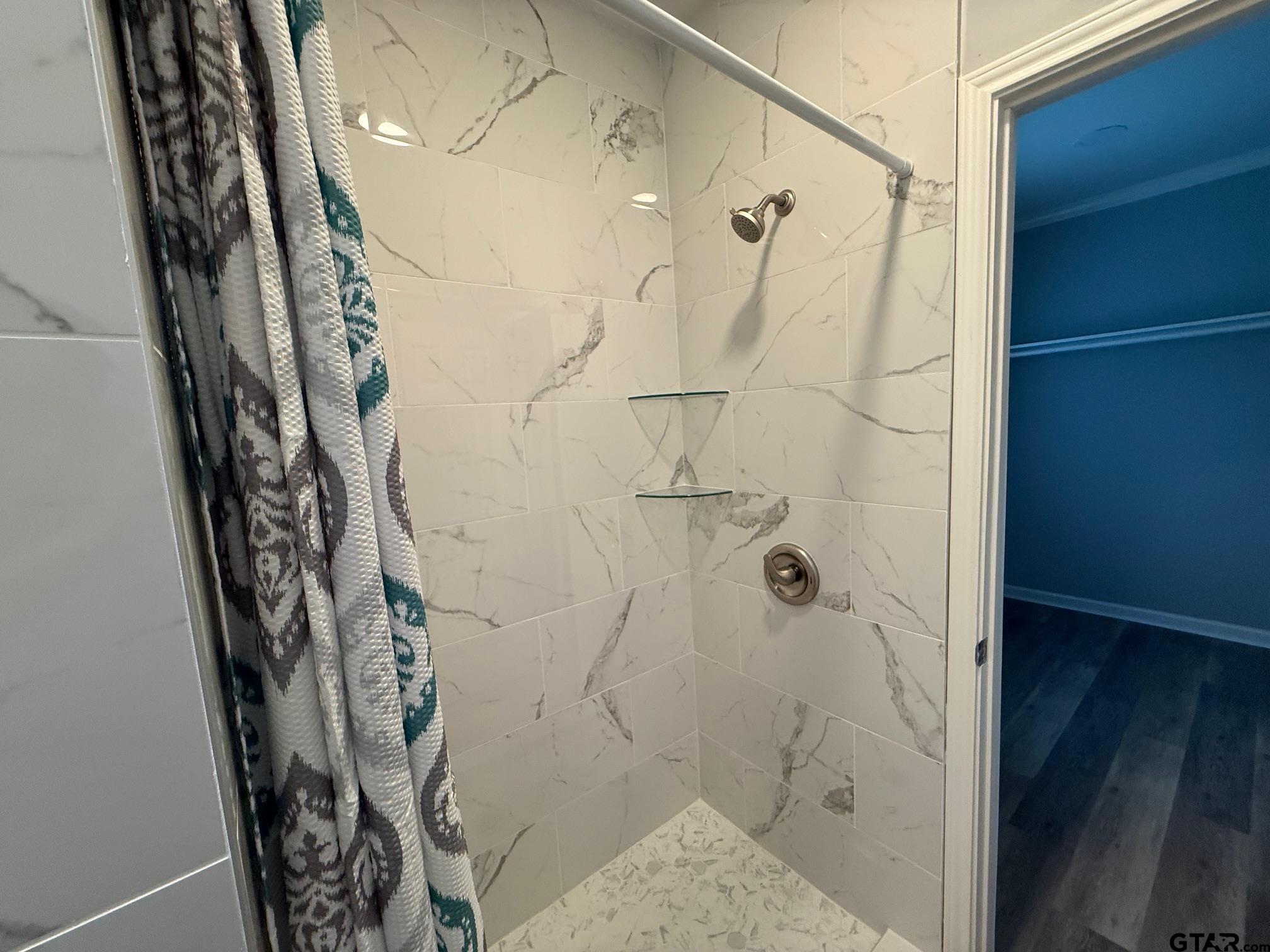 3248 Highway 79 Henderson, TX 75652 - Photo 24 of 44 a bathroom with a shower