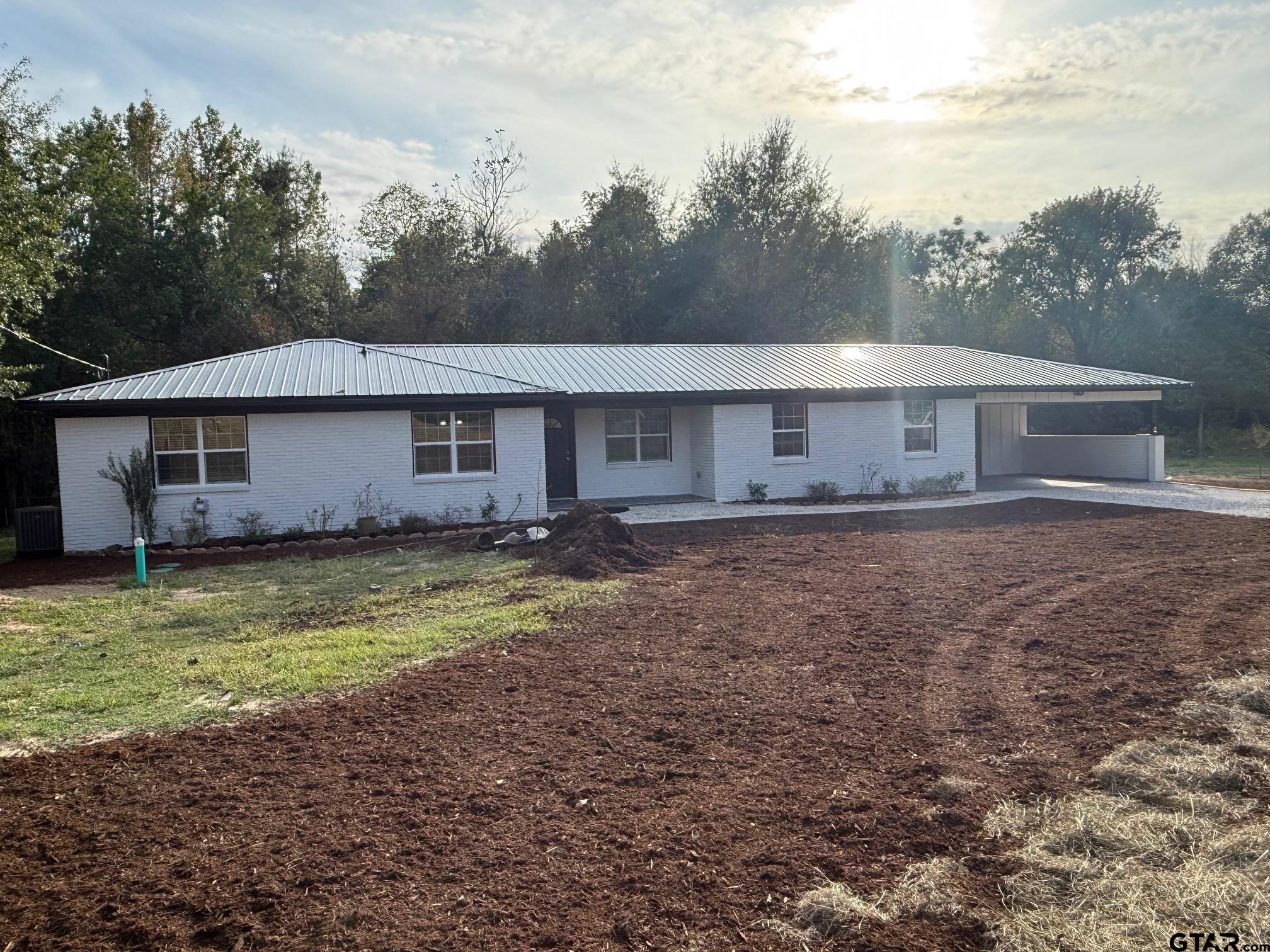 3248 Highway 79 Henderson, TX 75652 - Photo 36 of 44 a front view of house with garden